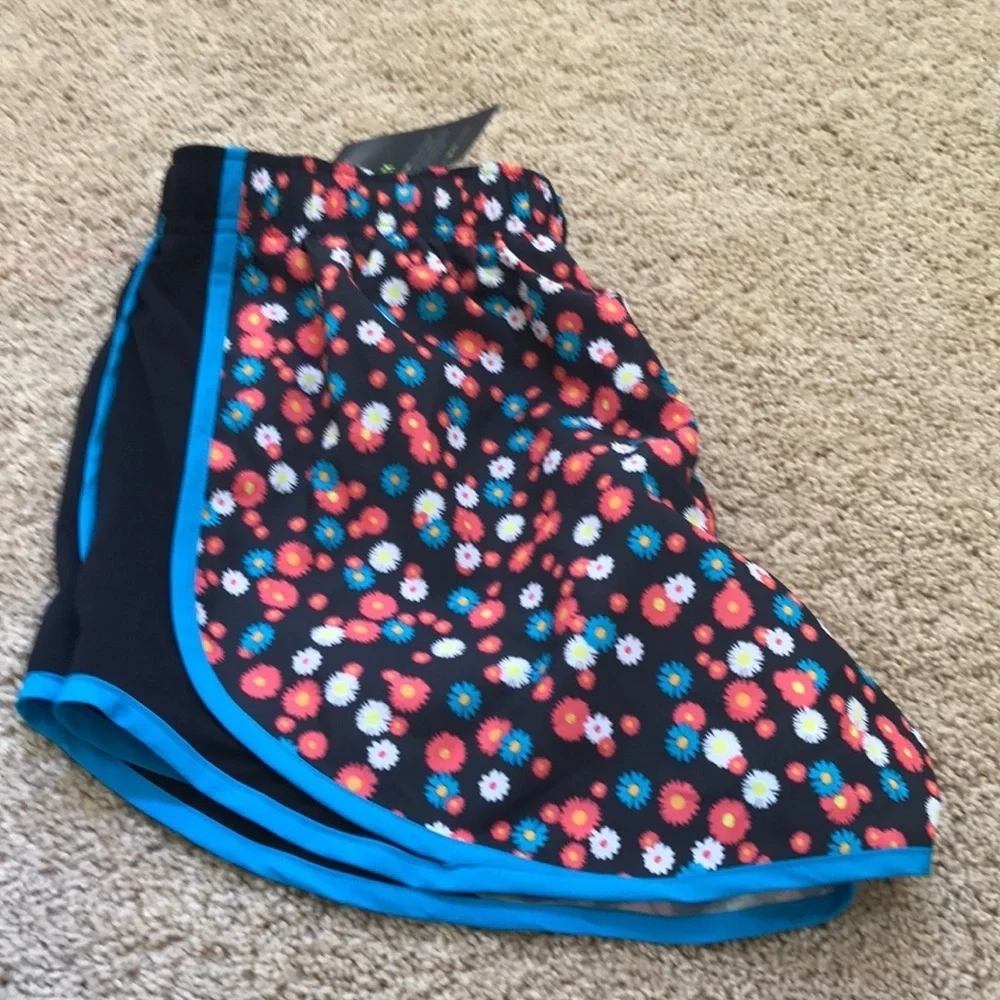 NWT! NIKE black with blue multi combo Size M running shorts